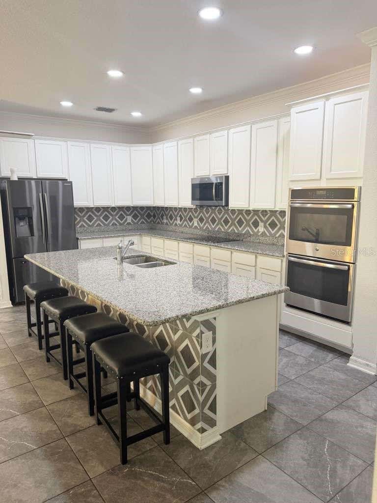 Photo of 14305 Fissore Boulevard, Wimauma, FL 33598 (MLS # TB8526490)