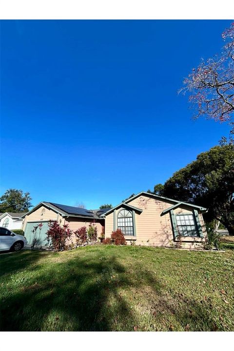 Photo of 5470 Higgins Way, Orlando, FL 32808 (MLS # O6368649)