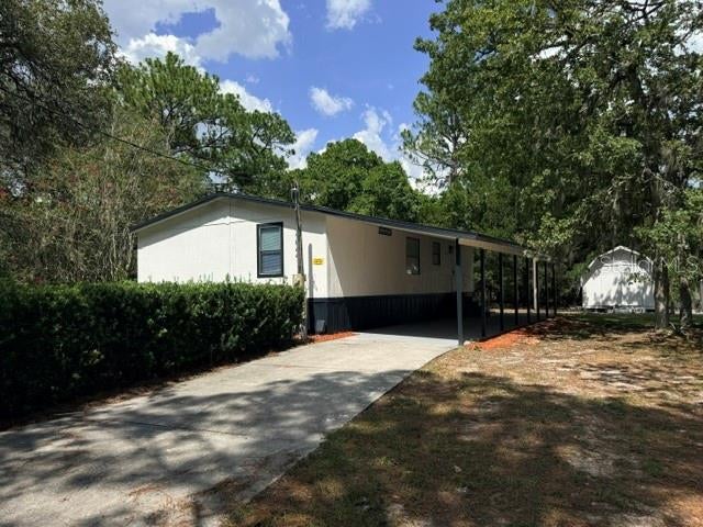 Photo of 17044 Eldridge Avenue, Spring Hill, FL 34610 (MLS # TB8532357)