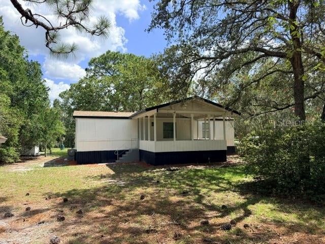 Photo of 17044 Eldridge Avenue, Spring Hill, FL 34610 (MLS # TB8532357)