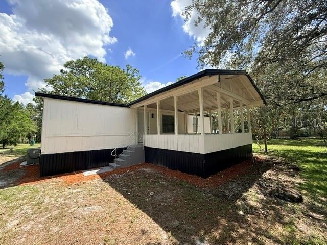 Photo of 17044 Eldridge Avenue, Spring Hill, FL 34610 (MLS # TB8532357)