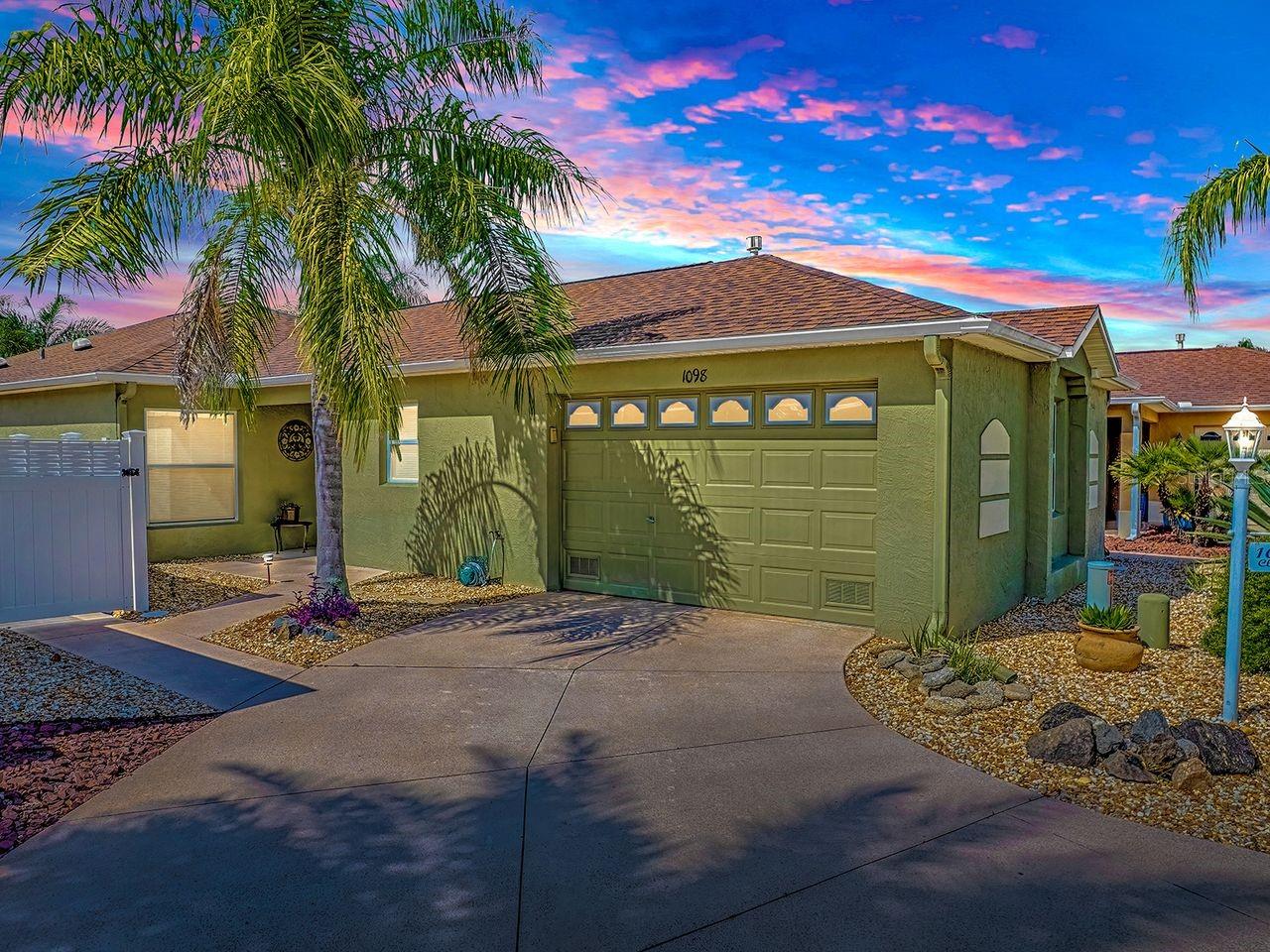 Welcome to this beautifully maintained charming Foxglove courtyard villa offering nearly 1,400 square feet of comfortable living space in the highly sought-after Village of Bonita. This inviting home features three spacious bedrooms and two full baths, inside laundry, granite counters, and easy-care tile and laminate flooring throughout—no carpet to worry about! Enjoy peace of mind with a brand-new roof installed in January 2025 and NO BOND, saving you thousands. Step outside to your own private oasis with beautiful gardens, plus room to add your dream pool - perfect for relaxing and entertaining year-round. Ideally located just two miles from Lake Sumter Landing, you’ll love being close to shopping, dining, golf, recreation centers, and nightly entertainment. Don’t miss this fantastic opportunity to own a move-in-ready villa in one of The Villages’ most desirable neighborhoods—schedule your private tour today!