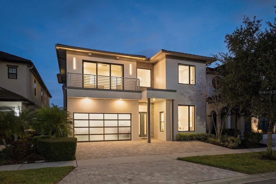 Located in the privately gated Bear’s Den neighborhood of Reunion Resort, this 8-bedroom, 8-full-bathroom, 2-half-bath home offers 5,625 heated sq ft and was built in 2018. The property has 12-foot ceilings on the first floor, a 2-car garage, and is offered fully furnished and turnkey. The home has never been rented and has only been used as a second residence. The kitchen features a double island layout, modern high-gloss cabinetry with lighted glass-front uppers, white quartz countertops, a JennAir gas cooktop with Zephyr range hood, two 36” JennAir built-in bottom-freezer refrigerators, a JennAir wall oven and microwave, and three JennAir dishwashers.The open living area connects to the outdoor space through corner sliding doors that lead to a covered patio with fireplace, a covered dining area with a built-in gas grill, vent hood, and sink, and motorized screens enclosing the entire space. The heated pool and spa include a sun shelf, an in-pool table with seating, and a pergola with a waterfall feature. An additional seating area with gas fire pit sits at the back of the pool, and a pool bath is accessible from the patio. The backyard has a private gate that leads directly into Golden Bear Park, available only to Bear’s Den residents. The park includes a putting green, great lawn, volleyball area, playground, and dog park.

Every bedroom has its own bathroom, including two bedrooms on the first floor. The primary suite features dual sinks, a freestanding tub, a walk-in shower, and a walk-in closet. A second first-floor bedroom also includes an en-suite. The second-floor layout features a loft with a wet bar, dishwasher, pool table, seating area, and a covered balcony overlooking the pool and Golden Bear Park. Two additional primary suites each include dual sinks, a freestanding tub, a walk-in shower, and private balconies at the front and rear of the home. Bedrooms five and six include en-suite bathrooms with a private game room between them, and bedrooms seven and eight are also en-suites. Additional features include a Legrand built-in audio system with speakers throughout the home and outdoor areas, and a first-floor powder room. Two laundry areas—one on each floor—provide added convenience.

Spanning 2,300 acres just 7 miles south of Walt Disney World, Reunion Resort is the only destination in the world featuring 3 signature golf courses designed by Jack Nicklaus, Arnold Palmer and Tom Watson. Reunion is also home to the Leadbetter Golf Academy. Onsite dining options include Eleven, 7593 Chophouse, Traditions, Grande Lobby Sushi Bar, the Clubhouse, the Cove, and Drifters at the waterpark. The water park features a lazy river, slides, outdoor games, and an aquatic playground. The gift shop in the Grande offers sundries and Starbucks coffee. Complimentary shuttles to the Disney transportation and ticket center leave from the Grande daily. Additional amenities include Camp Reunion, the tennis and pickle ball center, bocce ball, mini golf, foot golf, fitness center, playgrounds, dog park, various community pools including a roof top pool on the 11th floor of the Grande, and more. Zoning for short term rentals allows homeowners to rent their property by the night providing a great opportunity for investors. Reunion also works great as a primary residence or a private vacation retreat. The resort offers three separate 24 hour guard gated entries and one owner/resident only entry.