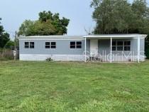 Beautiful 4-Bedroom, 2-Bath Mobile Home on a Country Half Acre
Welcome to peaceful country living! This spacious and well-maintained manufactured home sits on a generous half-acre lot with an oversized backyard—perfect for entertaining, gardening, or simply relaxing.
Step into a large, inviting living room with a bonus room just off to the right—ideal for a home office, playroom, or cozy den. The dining area and kitchen are separated by a sliding glass door that opens to the expansive backyard, offering easy indoor-outdoor living.
Outside, you’ll find a versatile storage shed/workshop/sheshed, adding even more functionality to this fantastic property.
Don’t miss this opportunity to own a serene country retreat with room to grow! Lease-Option Available with 10 % down!