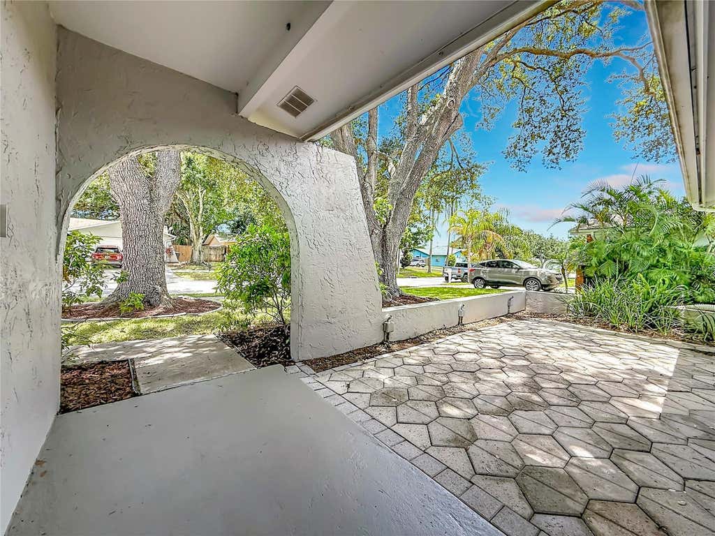 Photo of 1405 Overcash Drive, Dunedin, FL 34698 (MLS # TB8526004)