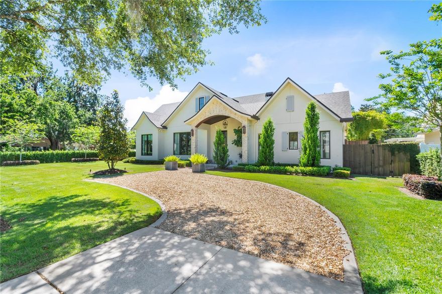 One or more photo(s) has been virtually staged. Gorgeous Alys-Rosemary Beach-style coastal residence in the sought-after Vias neighborhood near the WPRC and ICC. Built in 2020, nothing was overlooked with many custom finishes and thoughtful designer details that are captivating from the moment you walk through the front entry. A masterfully, well-designed open floor plan with soaring ceilings (decorative accent beams), along with quality expansive windows and glass doors flooding the home with natural light. Elegant living areas for various seating groups, including a bar area, living area, additional dining and gathering room all transition from inside to outside with a seamless flow that allows for comfortable casual Florida living and entertainment. The fabulous chef's kitchen offers a 6-burner gas range, two built-in ovens, an expansive “4-person” bar stool island in addition to a wonderful breakfast nook with pool views. The secluded primary suite includes another fireplace, separate walk-in closets, a lavish bath with private botanical garden, and French doors with peaceful views of the pool. The recently added den/home office complements the first floor flawlessly and can also be utilized as a secondary bedroom (includes a built-in with Murphy bed system) and en-suite bath. This home lives primarily as a one-level residence, having only 2 secondary bedrooms upstairs and they are more than generous in size as well. When making your way outside the main residence, there is a wonderful, detached pool cabana that features a wall of folding glass Casablanca-style accordion doors that bring the outdoors in. The cabana is equipped with a wet bar and a full bath, great for guests/in-laws, an art/yoga studio, separate home office, and much more. The outdoor area is truly an enjoyable private oasis including 7 perimeter gas lanterns. Enjoy Florida days and nights on the covered lanai with wet bar and in the picturesque pool and tranquil private backyard amenities. There is a climate-controlled detached two-car garage “carriage house” that is easily accessible to the main residence via a covered breezeway. There is also a parking area and wraparound front/side yard lawn encompassed by a podocarpus hedge and a private linear dog run or lawn with turf grass that completes the grounds. The Vias is an unsurpassed Winter Park neighborhood, just a few minutes away from downtown Winter Park/Park Avenue, A-rated schools, Winter Park Racquet Club, Interlachen Country Club and much more. Bedroom Closet Type: Walk-in Closet (Primary Bedroom).