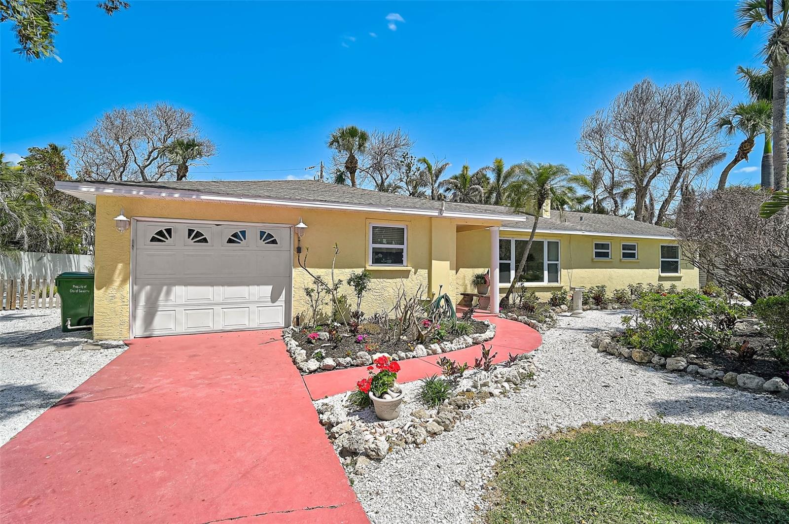 One or more photo(s) has been virtually staged. HUGE PRICE CORRECTION! **JUST REDUCED $375,000**Welcome to Saint Armands! Sarasota's most coveted luxury island neighborhood. Home to Saint Armands Circle where you will enjoy a full range of restaurants, shopping and entertainment. This sturdy and well maintained ranch style home sits just two blocks from all the activities that this location has to offer, and just a few minute walk to Lido's Public Beach. Situated on a curved pie shape lot allows for 135' of yard frontage opening up the opportunity for lush landscaping and an expansive space appearance. Inside the home you are greeting with beautifully restored terrazzo floors throughout the living and bedroom spaces. Boasting a wood burning fireplace, 3 over-sized bedrooms, 2 full bathrooms and two separate living spaces, you will surely have plenty of space to enjoy the Florida Island Lifestyle. Whether you are looking for a vacation home, full-time residency or a profitable investment property this home will check the boxes. Saint Armands continues to be one of the most highly sought after luxury areas to live in Sarasota due to its location, nearby amenities, its friendly neighbors, its active community association and its proximity to Downtown Sarasota. Be sure to add this to your must see list. Private showings available.