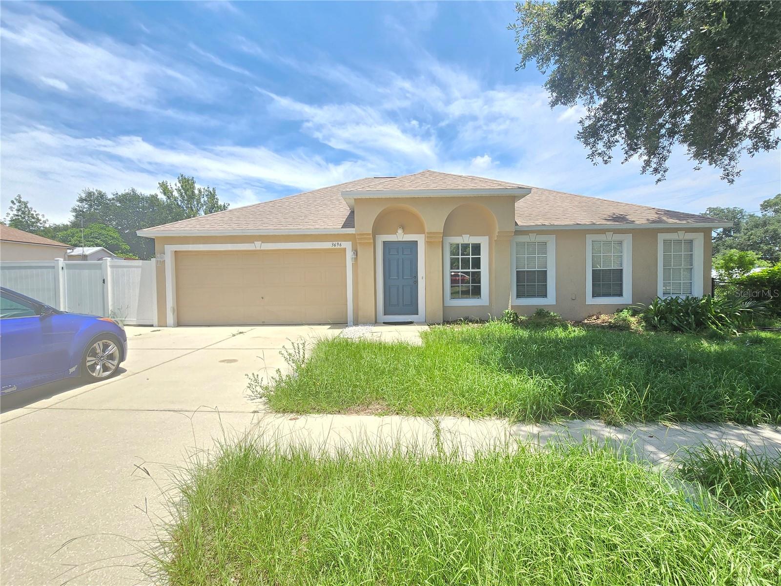 An ideal 4/2/2 family/ possible multigenerational corner lot home in the Sought Out area of the Wellington View Subdivision. This spacious home with a roof installed in 2001 boasts large gathering spaces inside and outside in an established neighborhood. The HVAC was installed in 2020 and the water heater was installed in January 2025. Upon entering the large great room with built in niches you will see it can be utilized as an office flex space or traditional dining/living room space. The oversized private primary bedroom is off to the right with an en suite bathroom with sunken tub, shower stall and private lavatory along with makeup station. The kitchen has upgraded granite, built in wood cabinets and a eat in kitchen space for easy meals. Outside has a concrete entertainment slab perfect for a fire pit or hot tub. The Massive fenced corner lot yard has plenty of space to add an in ground pool, volley ball net or trampoline. The fence was installed in 2022 . No Flood Insurance Required, Low HOA. The entertaining possibilities are endless. All information is deemed reliable, but must be verified by buyers.