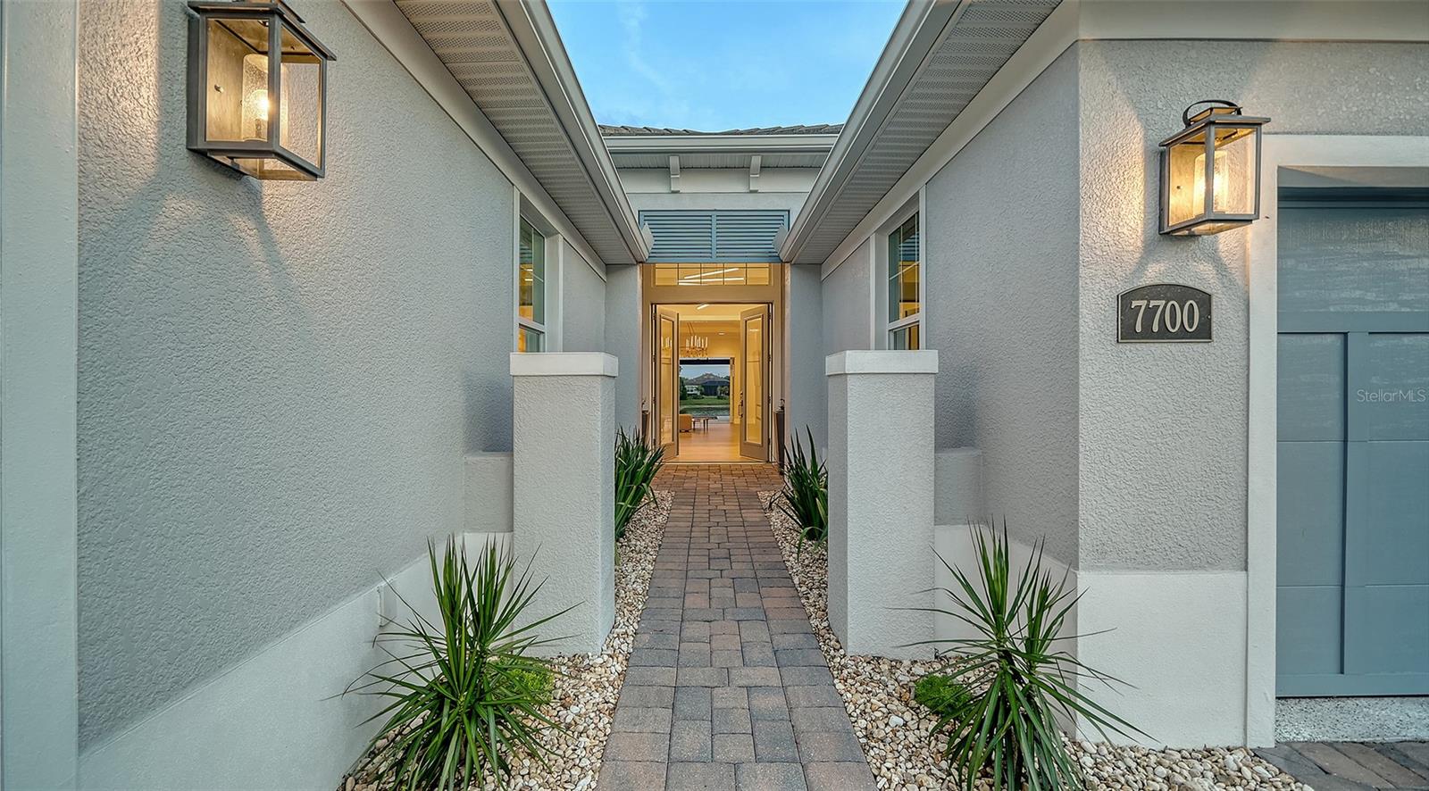 7700 SANDHILL LAKE DRIVE
