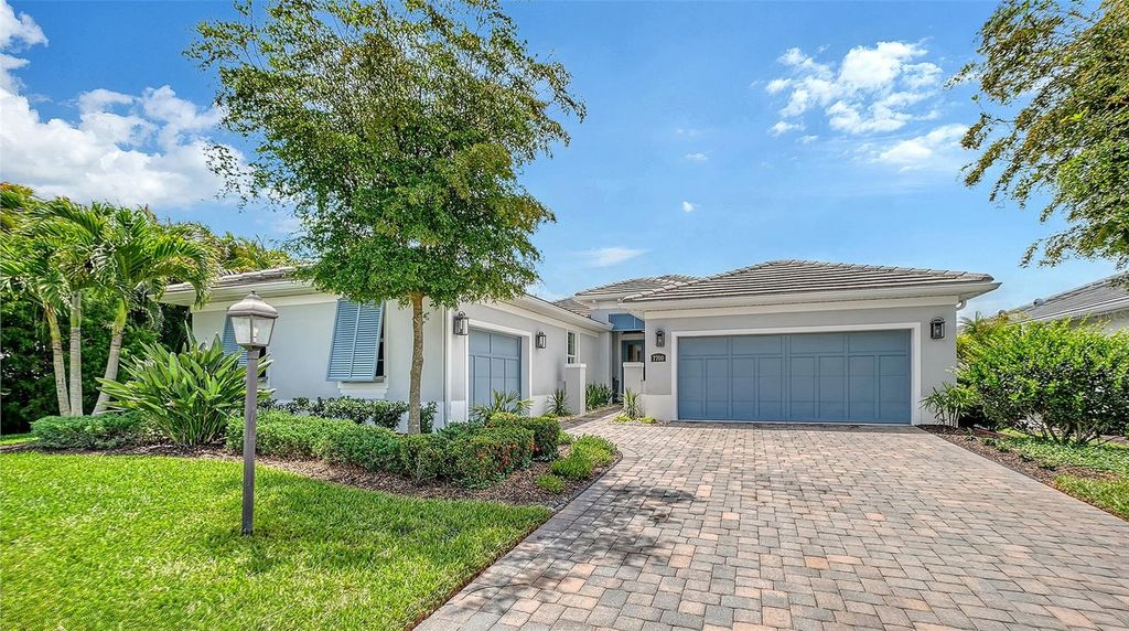 Photo of 7700 Sandhill Lake Drive, Sarasota, FL 34241 (MLS # A4692066)