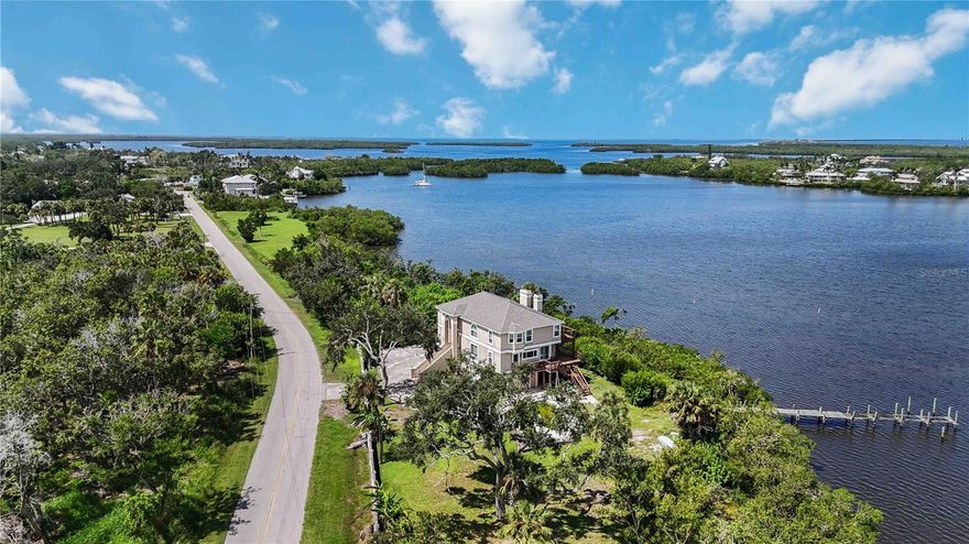 Welcome to Mariner’s Retreat, an extraordinary waterfront compound and development opportunity in the heart of historic Terra Ceia, Florida. Nestled along more than 475 feet of pristine shoreline on Tillette Bayou and Terra Ceia Bay, this rare Old Florida sanctuary spans approximately 9.64 acres across three parcels, offering a seamless blend of private coastal living and investment-grade potential. Anchoring the estate at 1470 Bayshore Drive is a meticulously updated, three-story residence encompassing over 3,600 square feet under air with a brand new roof as of late 2025 and all ceiling repairs have been done. Renovated in 2018, the home features impact-rated windows and doors, an updated kitchen and baths, new flooring and lighting, and a 2023 HVAC system. Mangrove trimming is underway to enhance sweeping water views—all the way to the iconic Sunshine Skyway Bridge. From the private dock, enjoy direct boating access to Terra Ceia Bay and the Gulf of Mexico within minutes. Whether it’s world-class fishing, dolphin sightings, or tranquil sunset cruises, life here flows with the rhythms of the water. Beyond the residence, the offering includes two development parcels across the street—1450 and 1460 Bayshore Drive—totaling over 8 acres of upland terrain with mature Florida landscape. Supported by a completed environmental study, these parcels have the potential for additional homesites to be built under Planned Development Residential (PD-R) zoning and a RES-1 land use designation. Specifics available upon request. The entire estate falls within Flood Zone AE, with base elevations of 9 to 10 feet, and offers flexible acquisition options, including the ability to purchase the entire estate or individual parcels. Owner financing may be considered for qualified buyers along with additional information and environmental reports. Mariner’s Retreat presents a rare opportunity to own a legacy estate that captures the timeless charm of Old Florida, while offering unique potential for future development or multi-generational living. All within easy access to St. Petersburg, Tampa, and the I-275 corridor—yet worlds away from the ordinary. Additional parcel tax ID's included: 2186900102, 2186900151