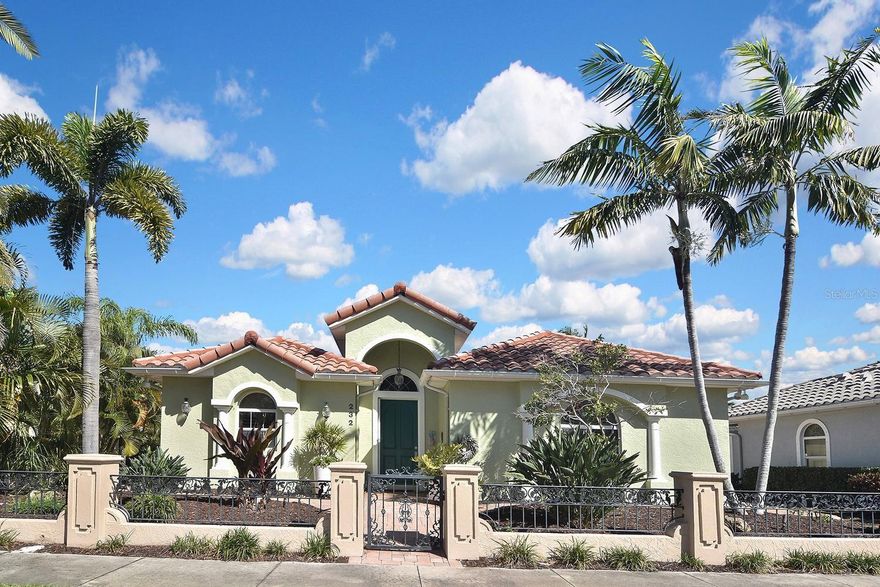 Live the coveted Venice Island lifestyle in one of its most desirable boutique communities—The Courtyards. This hidden gem of just 15 homes offers a rare blend of privacy, charm, and walkability. In under five minutes, stroll to downtown, the Venice Cultural Campus, and nearby parks, or enjoy a scenic 15-minute walk to the beach. Along the way, you’ll pass the Venice Island Recreation Area, featuring basketball, shuffleboard, tennis, pickleball, and a playground.

Downtown Venice delivers a vibrant mix of dining, shopping, and entertainment, while golf enthusiasts will appreciate easy access to the island’s course just 2.5 miles away—conveniently located near waterfront favorites Sharky’s on the Pier and Fins at Sharky’s.

This thoughtfully designed residence is centered around a private courtyard, creating a seamless indoor-outdoor lifestyle ideal for both relaxing and entertaining. The home features 2 bedrooms, 2 baths, a 2-car garage, and an oversized studio perfect for a home office, art space, or creative retreat. Residents also enjoy a charming shared gazebo, fostering a warm, neighborly atmosphere.

Inside, the open great room floor plan offers effortless flow, complemented by a split-bedroom layout for added privacy. The chef’s kitchen, anchored by a granite-topped island, is both functional and inviting. Plantation shutters throughout enhance the home’s light-filled spaces and add to its classic Florida charm.