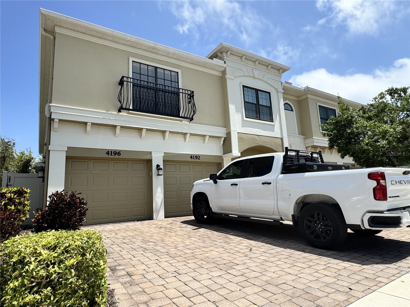 ANNUAL RENTAL AVAILABLE FOR IMMEDIATE MOVE IN. OFFERED FURNISHED OR UNFURNISHED. Welcome to this beautiful 3-bedroom, 2-bath townhome located in the desirable Palma Sola Trace community. This home offers a smart, functional design with all of the living space situated on the second floor for added privacy and comfort, while the garage is conveniently located on the first floor. The living room and dining room combo, located just outside of the kitchen, creates a perfect space for gathering with friends and family. The kitchen is a true highlight, featuring solid wood cabinets, sleek granite countertops, and a spacious layout that will inspire your inner chef. A laundry closet, conveniently located outside of the kitchen, offers added convenience and maximizes your living space. The master bedroom is a true retreat, offering plenty of room for a king-sized bed and more. It boasts a large walk-in closet and an en suite bath with walk-in shower and a spacious vanity, providing the perfect spot to unwind after a long day. The remaining two bedrooms are generously sized and can easily be utilized as guest rooms or home offices, offering flexibility for your lifestyle. These two bedrooms share a well-appointed bathroom with a tub/shower combo. One of the standout features of this townhome is the screened-in patio, where you can enjoy a quiet evening or sip your morning coffee while overlooking a tranquil lake. It’s an ideal spot to relax and take in the peaceful surroundings. As part of the Palma Sola Trace community, you'll have access to a variety of fantastic amenities, including a plaza pool, clubhouse with a fitness center, and a playground, perfect for staying active or enjoying time with family and friends. This location is also incredibly convenient, with easy access to the Gulf beaches, World famous IMG Sports academy, shopping, and dining, ensuring you’re never far from the best that the area has to offer. Schedule your showing today! UTILITIES INCLUDED IN RENT: CABLE, INTERNET, GROUNDS MAINTENANCE, TRASH.