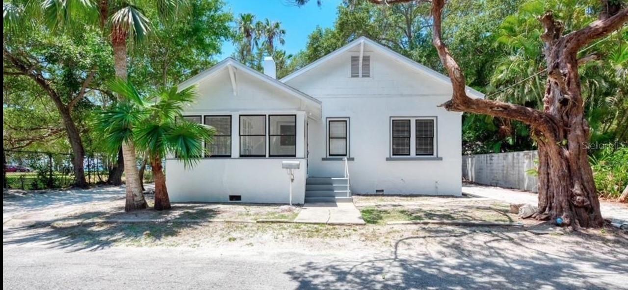 Charming 1924 Gem with Bay Peek — Minutes from Downtown Sarasota!
Step into this adorable 3-bedroom, 2-bathroom cottage-style home offering over 1,200 sq ft of comfort and style. Gorgeous wood floors flow throughout, and a welcoming front porch is perfect for relaxing with your morning coffee. Inside, enjoy a recently remodeled interior with a walk-in shower in the primary suite, convenient inside laundry, and partial furnishings to make moving in a breeze. Nestled in a quiet neighborhood with lush landscaping, plus a sneaky peek of the bay for your daily dose of inspiration. All just minutes from vibrant downtown Sarasota! Available for annual or short-term lease — flexible living at its best. Call today for your private showing.