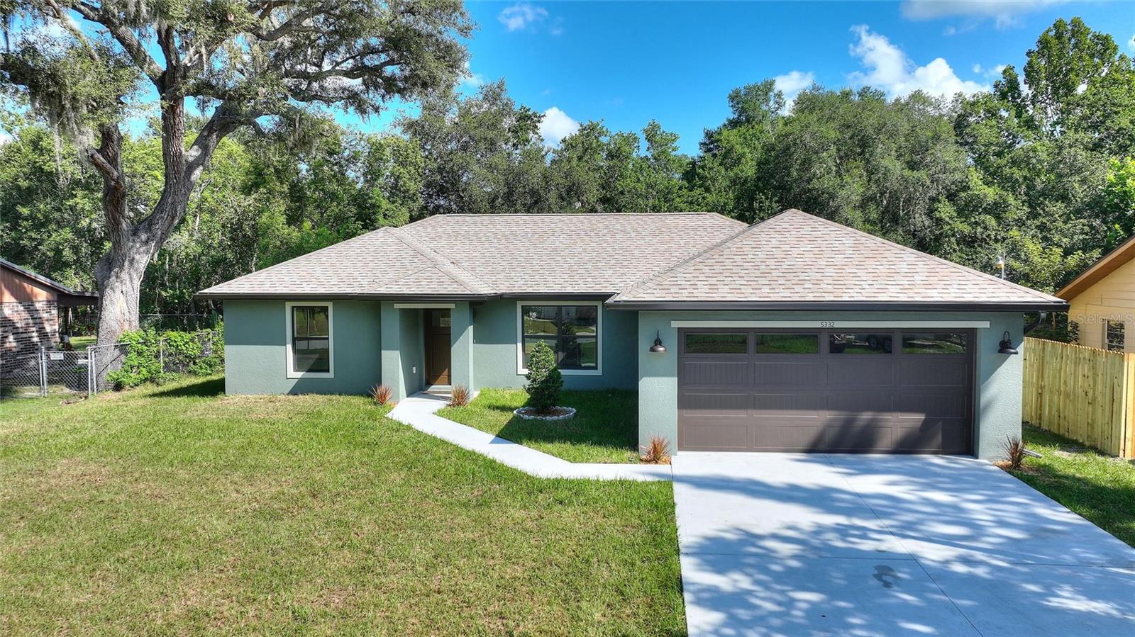 BRAND NEW BLOCK HOME! NO HOA!
Welcome to your dream home, where style meets functionality. This spacious split floor plan features 3 bedrooms, 2 bathrooms, 2-car garage, and 1850 under-roof square footage. It is tucked nicely in a well-established, peaceful neighborhood. This thoughtfully designed spec home provides comfortable, modern living with a Custom Home feel. The Under-Truss Front Porch invites you into the bright and airy Main Living Area, with vaulted ceilings and ample lighting. Beautiful granite countertops and mixed-metal finishes are perfectly placed throughout. The stunning Kitchen displays stainless-steel Samsung appliances, tons of cabinetry, an island with seating, and a classy food pantry. Timeless Waterproof Luxury Vinyl Plank flooring runs throughout this home for durability and style. A Samsung front-load washer and dryer set, over 8 feet of granite countertop folding space, and an abundance of cabinetry... make this dedicated Laundry Room a dream come true! The large Primary Suite leads to a lovely walk-in closet with double racks, for extra clothing storage. The Ensuite features dual sinks, a walk-in shower, and a linen closet, adding convenience. Across the home, you will find 2 large Bedrooms separated by a gorgeous Bathroom. Past the dining area, the sliding-glass door opens to a Private Backyard; perfect for relaxing or entertaining guests.
This home is ideally situated between Tampa and Orlando, offering quick access to Interstate 4 and other major roadways.
This home will not last long.. Call for your private showing today!!!