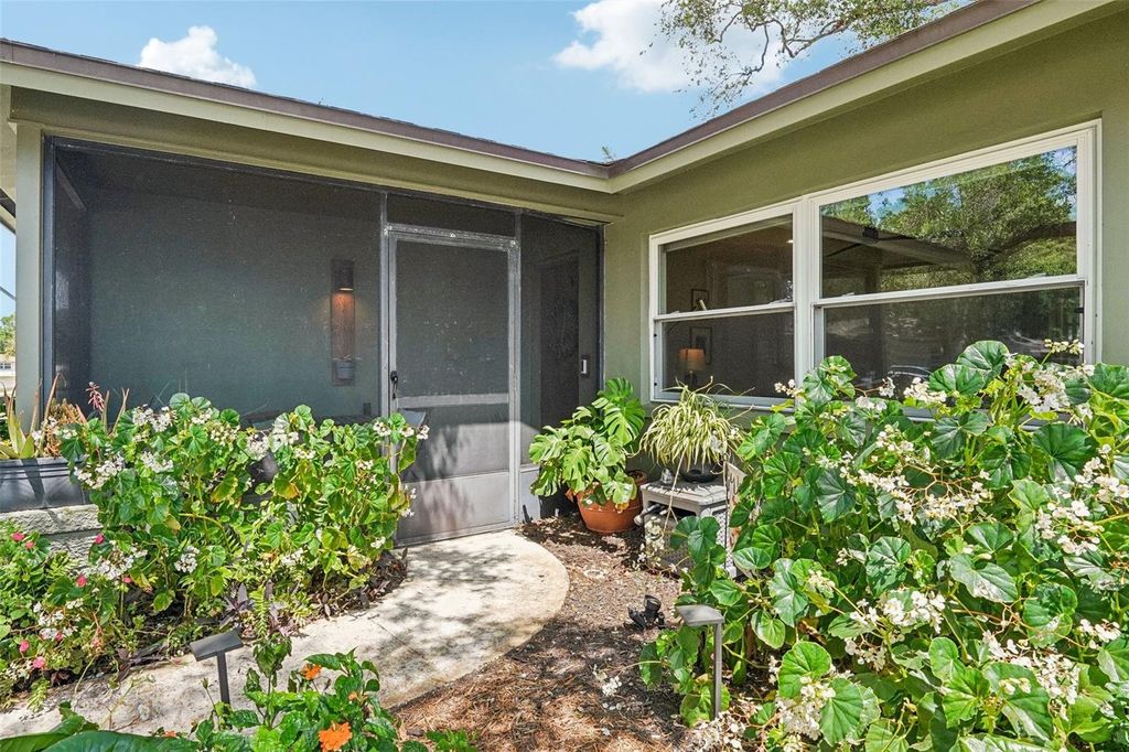 Photo of 11469 Imperial Grove Drive E, Largo, FL 33774 (MLS # TB8491087)