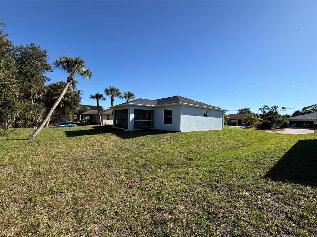 Photo of 2098 Wheeling Avenue, North Port, FL 34288 (MLS # C7517705)