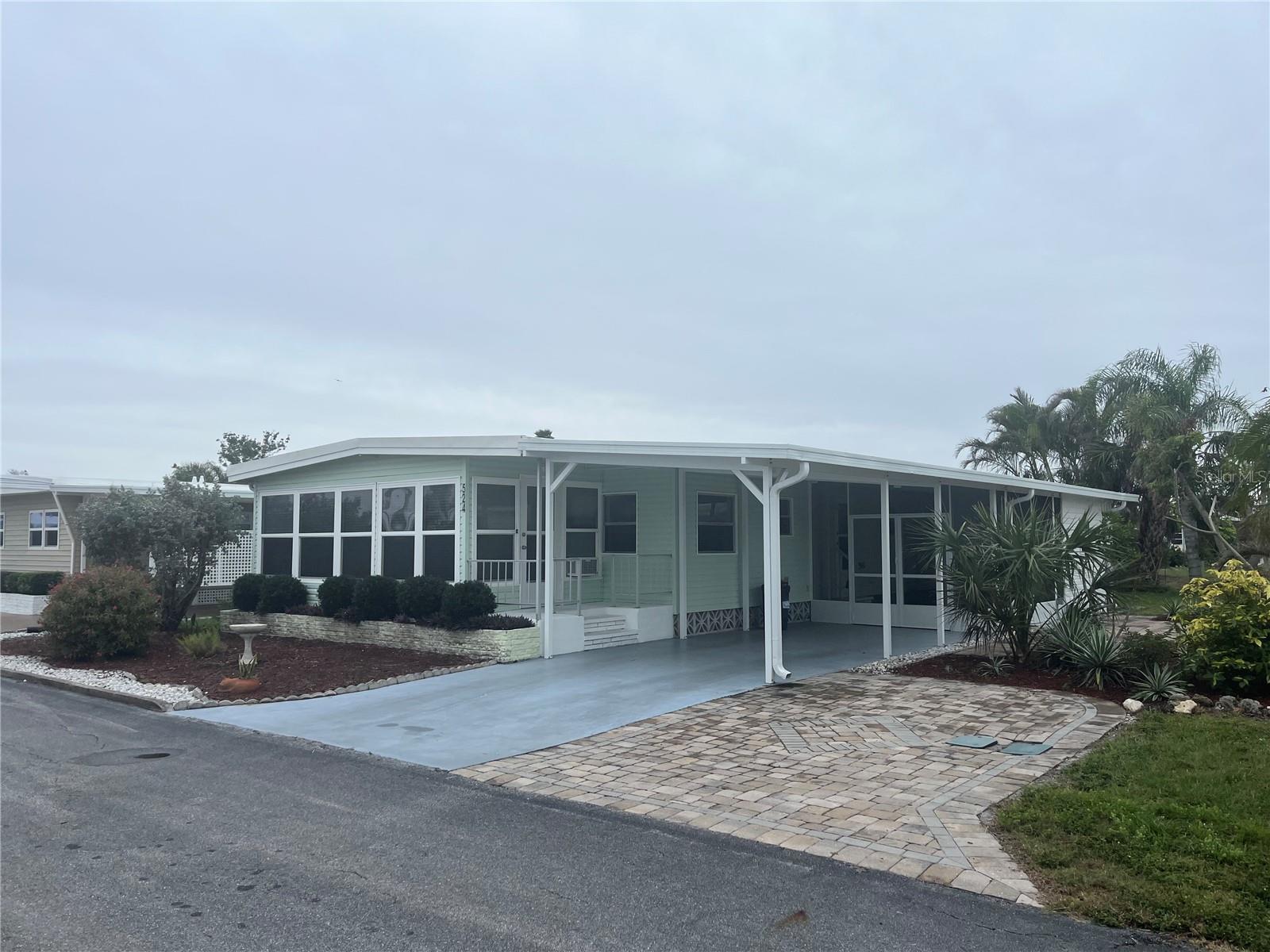 New carport and shed built to hurricane codes, New double pane windows in the Aced Florida room, both baths are updated, New supply plumbing, INSIDE washer and dryer, Newer hot water heater, and as a bonus extra side pavers for side by side parking,
Venice Isle is the premier resident owned over 55 Mobile home Park in Venice. There are close to 1000 homes with the most active residents. There is always something going on for you to do. We have many Park gatherings and first rate shows on site. The Park has every amenity you can imagine. Come take a walk through both of our 2 clubhouses and make yourself at home. The Park has 2 tennis courts, a fitness center, 2 heated pools, 2 hot tubs, saunas, putting greens, shuffleboard, Bocce ball, miniature golf, art rooms, pool room, TV lounges, card rooms, library, horseshoes, ceramic kilns, 2 huge ballrooms, Sunday services and much more!