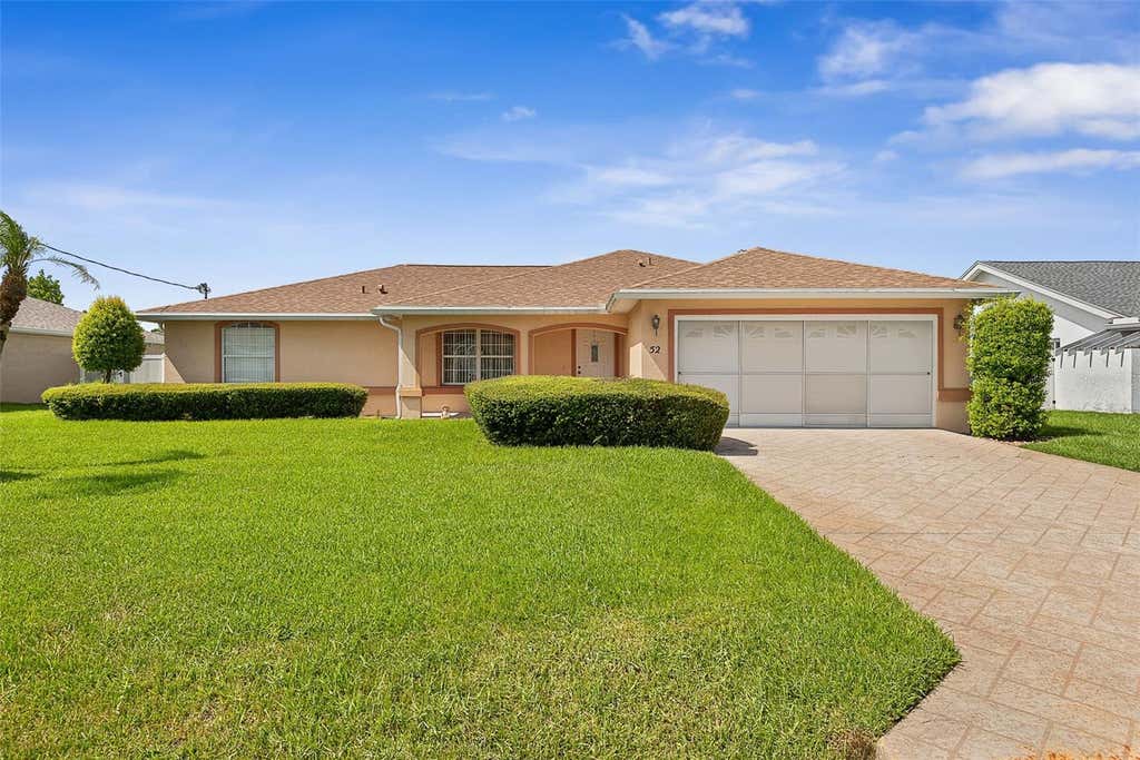 Photo of 52 Fenwick Lane, Palm Coast, FL 32137 (MLS # FC320552)