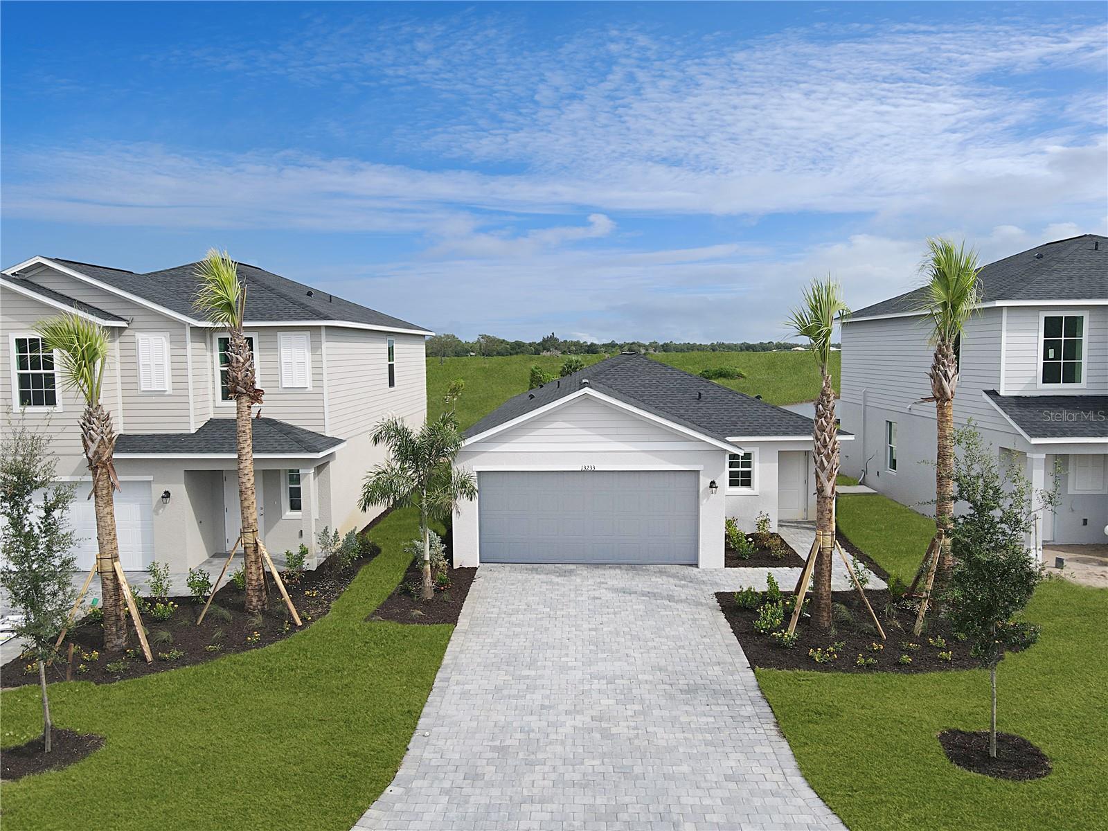 Under Construction. Discover the allure of Lennar's single-family homes at Turnleaf, just an hour’s drive to the picturesque beaches and endless adventures in Punta Gorda, FL. Embrace an active and healthy lifestyle with an array of exclusive amenities including a clubhouse, swimming pool, pickleball court, playground and bocce court. This new home is laid out on a single level for low maintenance living. Two secondary
bedrooms share a bathroom in the hall at the front of the home, while the owner’s suite is tucked into the back corner with an attached bathroom and walk-in closet. Down the foyer is the open-concept living area, which includes a fully equipped kitchen, an intimate dining room and family room with patio access. Completing the home is a convenient two-car garage. Prices and features may vary and are subject to change. Photos are for illustrative purposes only. Estimated completion date is Sept/Oct 2025.