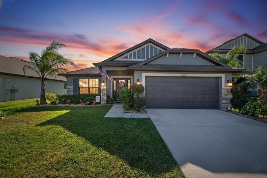 Welcome home to Aviary at Rutland Ranch—an inviting Gulf Coast community where comfort, style, and Florida living come together beautifully. Start your mornings on the front porch with a cup of coffee, then unwind in the evenings on the spacious covered lanai overlooking a peaceful pond—perfect for entertaining or simply relaxing and enjoying the view.  Built by Adams Homes in 2020, this thoughtfully designed 4-bedroom, 3-bath home offers a bright, open layout and standout curb appeal with attractive stone accents. Step inside to a welcoming hallway and a spacious dining room, ideal for hosting gatherings with room for an eight-seat table.  The stylish and functional kitchen features granite countertops, white cabinetry, pantry, island, breakfast bar, and a sunny side window that fills the space with natural light. Up front, two bedrooms share a well-appointed bathroom with double sinks, a private water closet, and a tiled tub/shower combo—perfect for family or guests.  At the heart of the home, the open living area showcases gorgeous views through double glass doors leading to an extended lanai, and tranquil pond beyond—your own private backyard retreat.  The spacious primary suite offers pond views, a tray ceiling, walk-in closet, and an ensuite bath with double vanities, private water closet, and a beautifully tiled walk-in shower.  Additional highlights include a utility/laundry room plus a two-car garage.  Residents of The Aviary enjoy top-notch amenities including a resort-style pool with covered seating and pond views, two pickleball/tennis courts, a half-court basketball area with additional gathering spaces, playground, and scenic walking paths.  Conveniently located near top-rated schools, shopping, and Fort Hamer Park—where you can launch your boat and enjoy the Manatee River, Tampa Bay, and the Gulf. You’re also ideally situated between St. Pete and Sarasota, close to Lakewood Ranch, Anna Maria Island, and just about an hour to Tampa for sports, dining, and city life. And yes—some of the nation’s best beaches are right here waiting for you. Don’t miss your chance to make this Florida dream home yours!