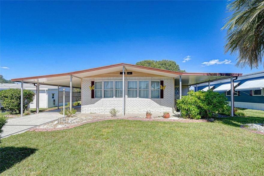 CASA DEL SOL! Enjoy the Florida Retirement Lifestyle! Step into comfort and convenience in this spacious 2-bedroom, 2-bath home located in the friendly 55+ community of Casa Del Sol. This well-maintained residence offers plenty of living space with a large family room featuring a wet bar, perfect for entertaining friends and an additional bonus room for hobbies, relaxation, or overnight guests. You’ll love the bright island kitchen with a breakfast bar, skylight, pantry, and wall oven ideal for those who enjoy cooking or gathering around the table. The dining area features a built-in china hutch, and the living room offers a cozy spot to unwind with a good book from your built-in shelves. Convenience continues with inside laundry and extra storage cabinets, plus a metal roof, covered carport, and storage shed/workshop. The home is being sold fully furnished, so you can move right in and start enjoying the Florida sunshine! This vibrant community lifestyle offers a clubhouse, pool, shuffleboard, and a calendar full of activities perfect for meeting new friends and staying active. Located close to shopping, dining, grocery stores, and pharmacies, everything you need is right at your fingertips. And the best part? No lot rent! Own your land and your home in one of Zephyrhills’ most desirable retirement communities. Whether you’re looking for a full-time residence or a warm winter getaway, this is the place to call home.