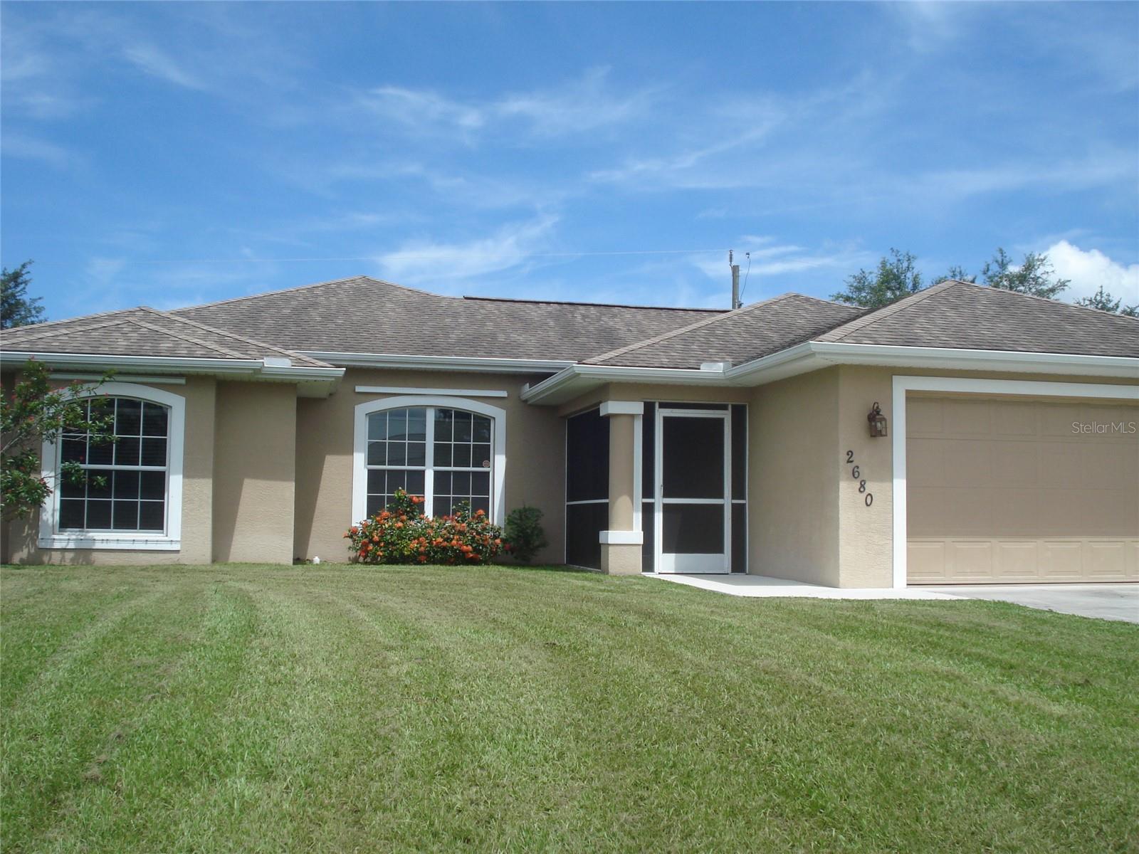 Beautiful home on great area. Great location near school. Well maintained 4 bedroom 2 bath home or 4th bedroom can be an office. Open concept home with split bedrooms and a screened lanai and vaulted ceilings. The home offers an office with built-in shelving as well as a huge outdoor shed/workshop with AC. The workshop is 10 x 20, insulated, with a wall mount AC unit , 60 AMP electrical service and a large workbench for the handy person in the household. Close to beaches, shopping, highways. A great opertunity for any handy person that needs extra storage. A must see. One owner is a licensed real estate broker in state of Florida.