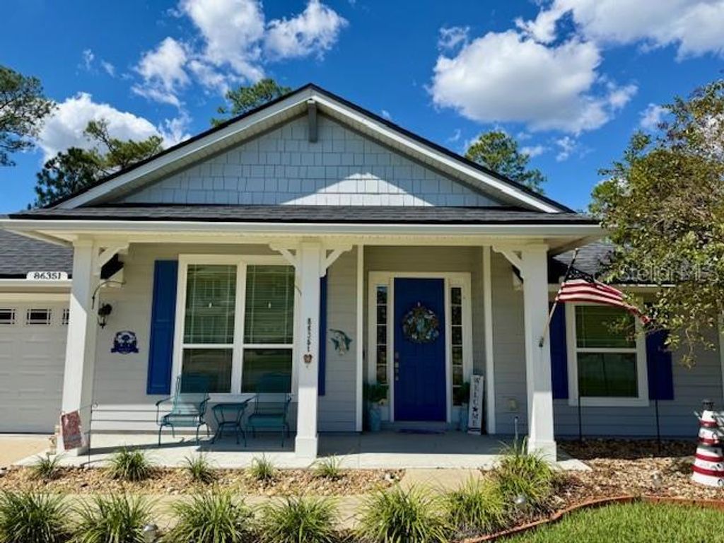 Photo of 86351 Moonlit Walk Circle, Yulee, FL 32097 (MLS # L4956191)