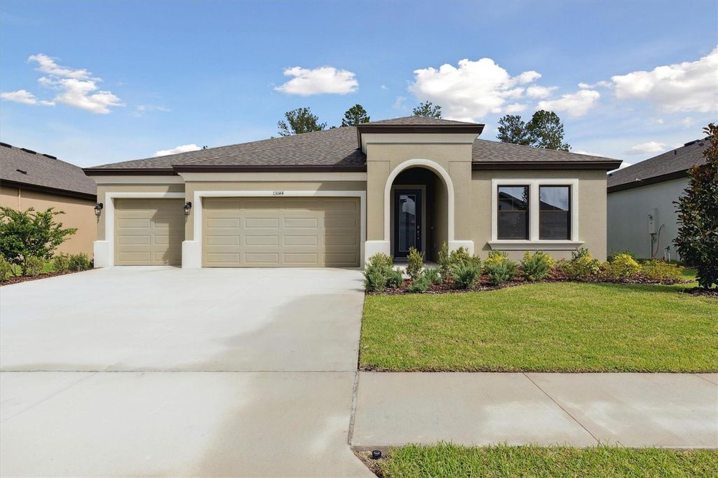 Photo of 13144 Long Valley Circle, Spring Hill, FL 34609 (MLS # TB8436877)