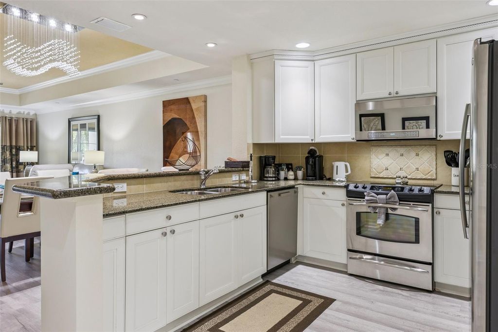 Photo of 7602 Sandy Ridge Dr #103, Reunion, FL 34747 (MLS # O6402744)