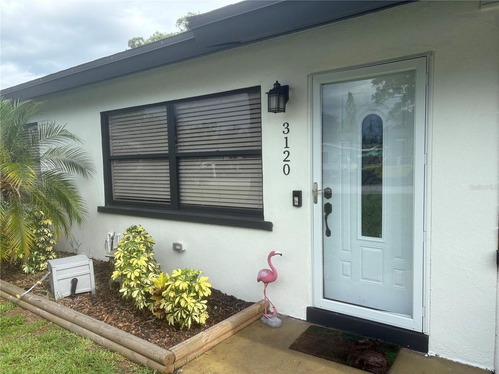 Photo of 3120 Meadow Lake Avenue, Largo, FL 33771 (MLS # TB8401601)