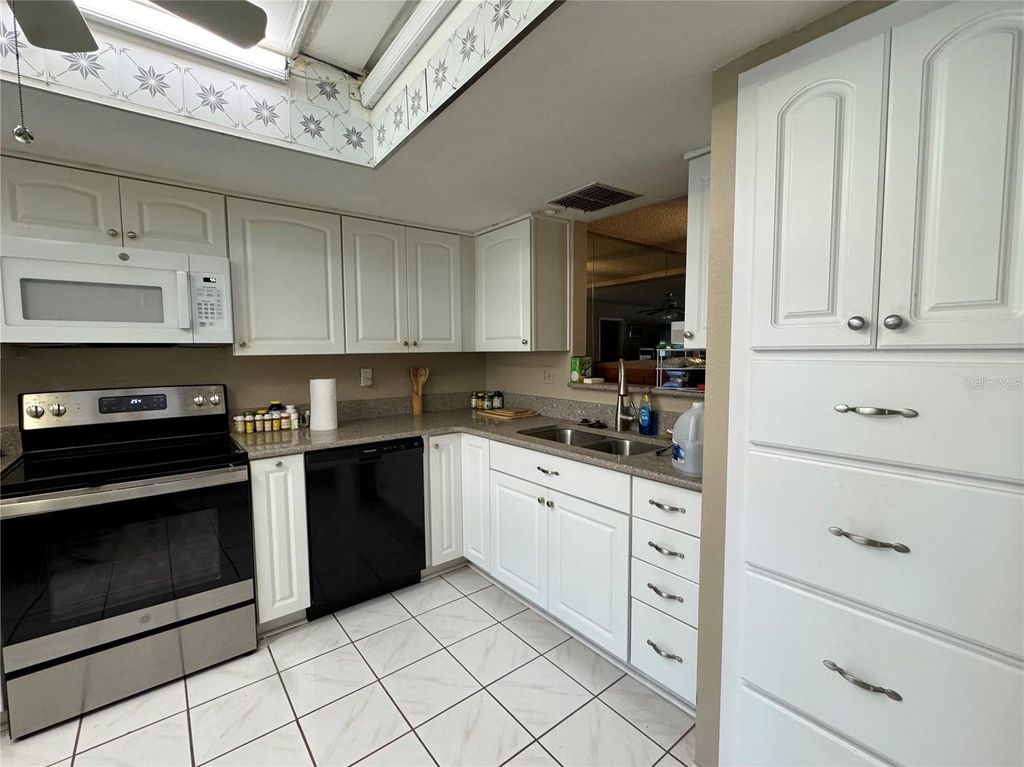 Photo of 11231 Dollar Lake Drive #1, Port Richey, FL 34668 (MLS # L4956369)