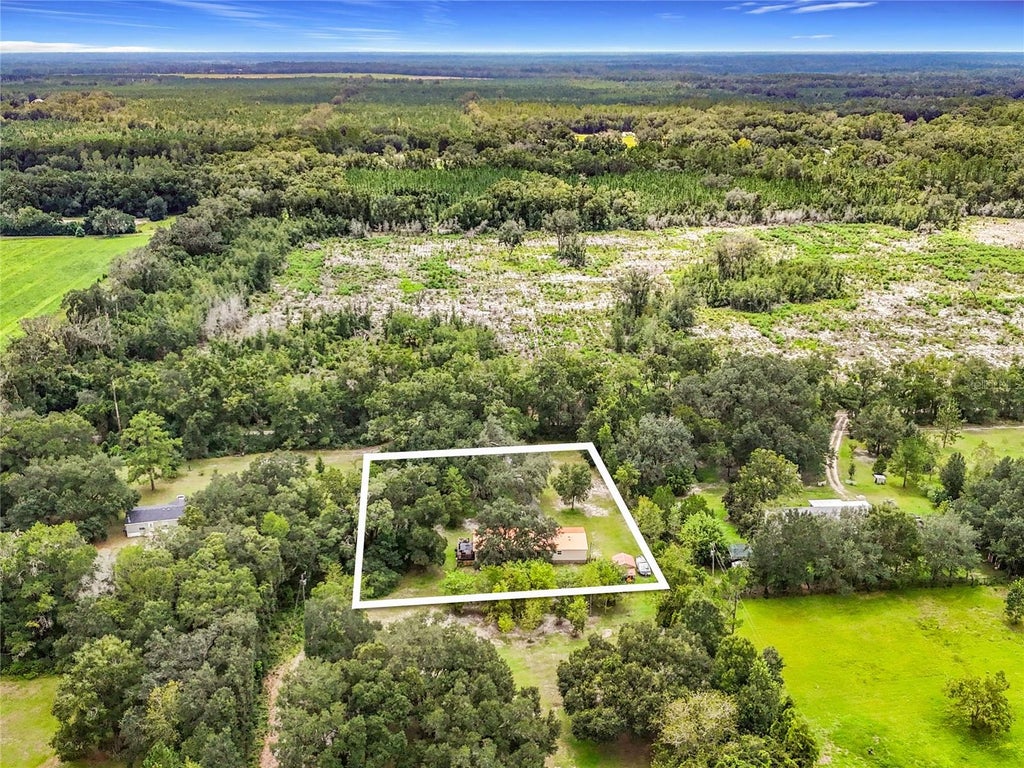 Photo of 13906 SW 132nd Place, Archer, FL 32618 (MLS # TB8544207)