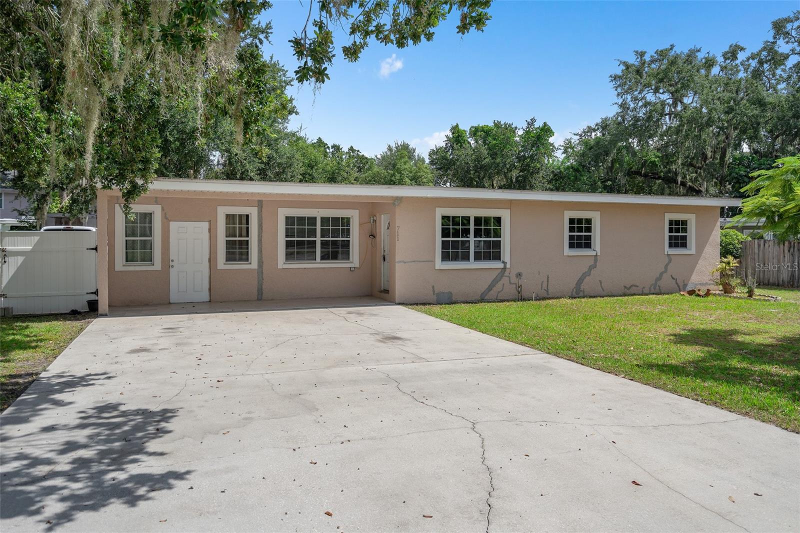 Experience traditional Kissimmee charm in this well-maintained 3-bedroom, 1-bath home with hardwood finishes. Enjoy cooking in the granite-equipped kitchen that includes all major appliances. Relax on the expansive covered porch overlooking a generous 0.35-acre lot (15,500 sq ft lot). A handy utility shed with a 10×10 overhang and large driveway offers storage and workspace options. With a solid structure built in 1958, it’s an excellent opportunity for homeowners or investors alike.