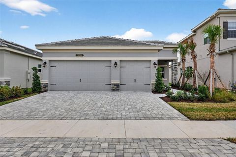 Photo of 32268 Mahogany Valley Drive, Wesley Chapel, FL 33543 (MLS # TB8465125)