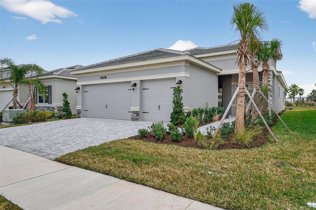 Photo of 32268 Mahogany Valley Drive, Wesley Chapel, FL 33543 (MLS # TB8465125)