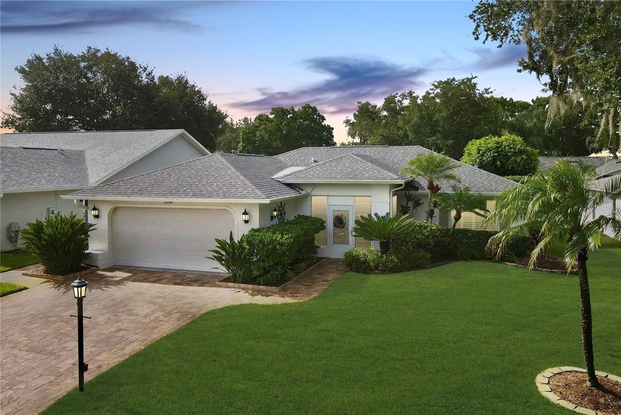 Welcome to your dream active 55+ home in the Highland Lakes community! This charming 3-bedroom, 2-bath split floorplan home is perfect for the golf lover who wants to enjoy the best that Pinellas County has to offer. As you enter, you'll be greeted by the shaded screened front porch with lovely front yard views. The foyer entrance opens to a spacious and well-maintained interior with incredibly open views to your Florida rooms with VAULTED CEILINGS and a wall of windows.. Enjoy private views year round! The VAULTED ceilings (impossible to find in Highland Lakes) add a touch of elegance and make the space feel even more open and airy.The spacious kitchen is a chef's delight, featuring a double basin sink, Corian countertops, and a generous breakfast room where you can savor your morning coffee. The primary suite boasts a walk-in closet, providing ample storage space, and the third bedroom also has its own walk-in closet. Additionally, the home offers a large laundry room with a soaking sink for your convenience. Rest assured, this home roof features a NEW ROOF (only 2 years old). The paver driveway adds a touch of elegance and completes the curb appeal of this beautiful property. The home features a 2-car garage with an automatic garage door opener for convenience. With an irrigation system on a deep well, maintaining the lush landscaping will be a breeze. Located just across the street from the walkway to the community pool, you'll have easy access to a refreshing swim whenever you desire. What's more, this location is high and dry, so there's no need for flood insurance! Highland Lakes is renowned as a premier active 55+ community, and it offers an abundance of amenities to cater to your every need. Take advantage of the various clubs, community lodge, heated pool/spa, arts/crafts building, tennis courts, and a 27-hole golf course. You'll also appreciate the boat/RV storage available on-site, ensuring you have plenty of space for all your toys. Don't miss out on this fantastic opportunity to live in the Highland Lakes community. Embrace the ACTIVE retirement lifestyle you deserve in this golf, and fishing lover's paradise.