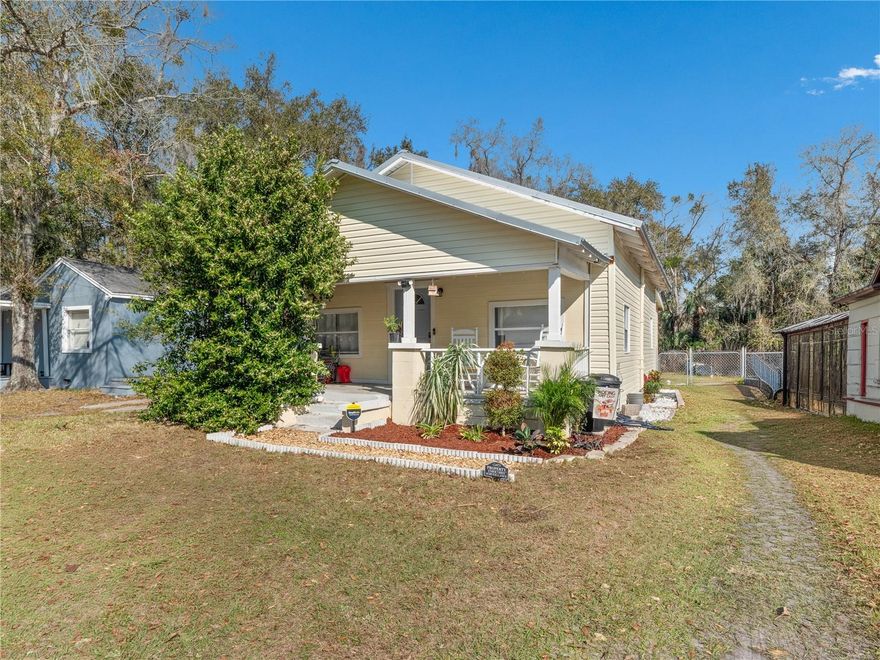 Welcome to this beautifully updated Sanford home offering style, function, and long-term value in an established neighborhood just minutes from Historic Downtown Sanford, Lake Monroe, the Riverwalk, restaurants, boutiques, Farmers Market, major roadways, beaches, theme parks, and downtown Orlando. Situated on a spacious, fully fenced lot with no HOA, this move-in ready property features a 2023 custom-built metal roof and roof deck, new exterior improvements, and a new water heater for peace of mind. Inside, you’ll find an open-concept layout with high ceilings, rich wood-look flooring throughout, and a modern kitchen showcasing white shaker cabinetry, stainless steel appliances, updated fixtures, tile backsplash, and a functional center island perfect for everyday living and entertaining. The remodeled bathroom adds contemporary appeal, while the dedicated interior laundry room provides added convenience. The oversized backyard offers endless possibilities for pets, gatherings, gardening, or future expansion. Security cameras and alarm system convey with the property. Ideally located near highly rated Crooms Academy of Information Technology and just minutes from everything that makes Sanford desirable, this home delivers charm, upgrades, location, and opportunity. Schedule your private showing today.