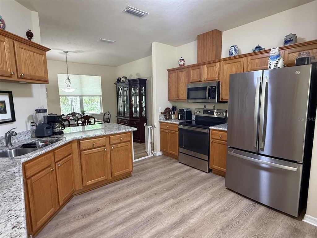 Photo of 11570 NW 74th Terrace, Alachua, FL 32615 (MLS # GC540063)