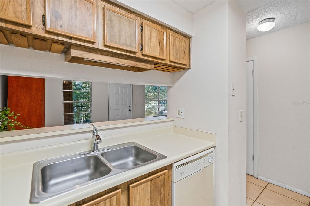 Photo of 4003 Nestle Oaks Place #204, Tampa, FL 33613 (MLS # TB8443710)