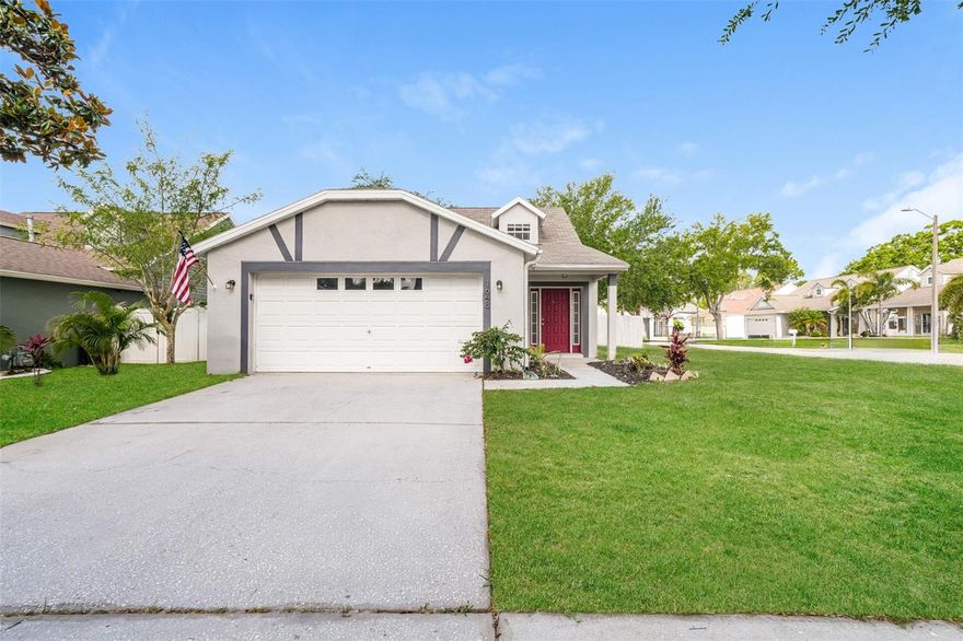 One or more photo(s) has been virtually staged. Do not miss out on this beautiful, corner lot home in a quiet, treelined community in Tarpon Springs. Sleek vinyl flooring throughout the home provides cool comfort. The kitchen boasts modern stainless steel appliances that all convey, along with a range hood and contemporary white cabinets. The backyard is an oasis with an oversized patio, mature trees, and is fully fenced for privacy. The primary bedroom is located on the first floor, with all other bedrooms upstairs. This is a true move-in ready home in a great location, central to premier golf courses, restaurants, entertainment, and the Gulf! See this one today!