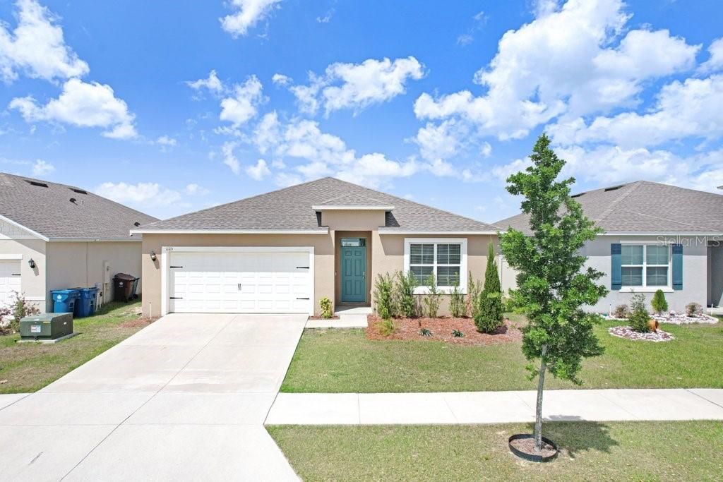 Photo of 1125 Torrente Lane, Haines City, FL 33844 (MLS # TB8492866)