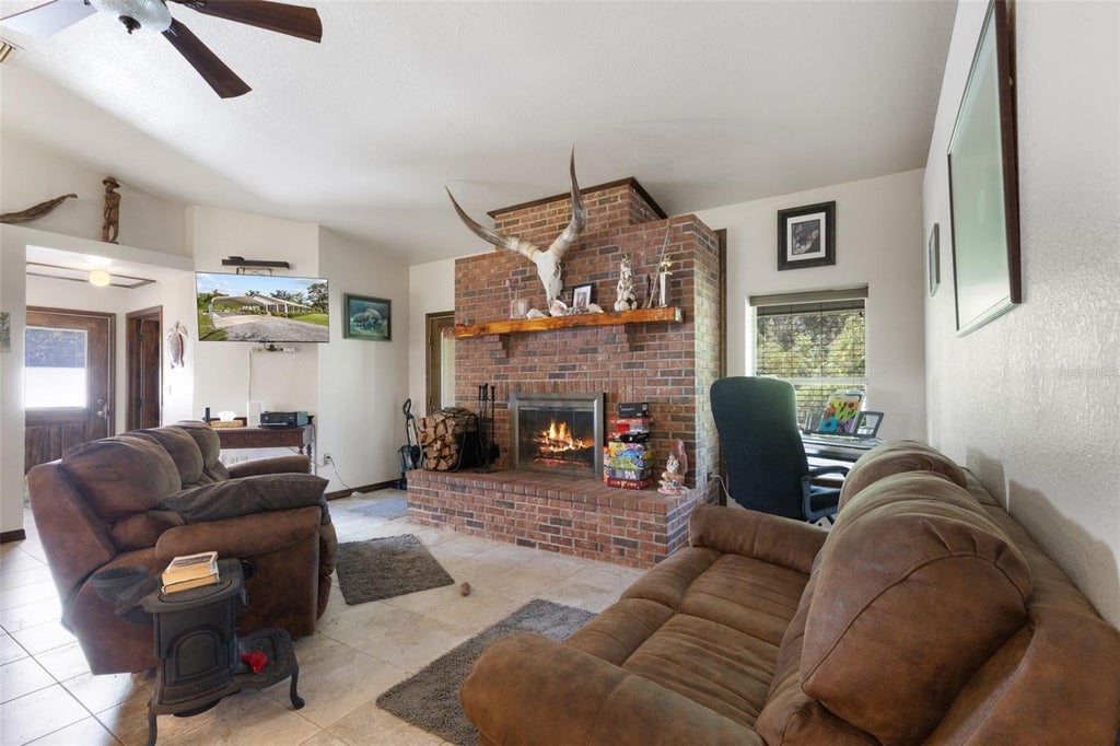 Photo of 303 NE 290th Avenue, Old Town, FL 32680 (MLS # GC543136)
