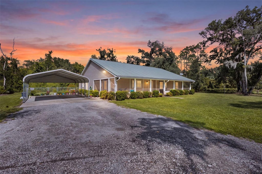 Photo of 303 NE 290th Avenue, Old Town, FL 32680 (MLS # GC543136)