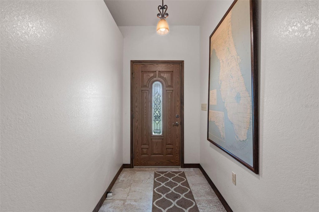 Photo of 303 NE 290th Avenue, Old Town, FL 32680 (MLS # GC543136)