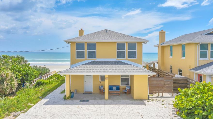 Exceptional Direct Oceanfront Opportunity with Proven Income Potential

Located at 2101 Hill Street in New Smyrna Beach, this direct oceanfront residence presents a rare opportunity to combine lifestyle and investment in one of the area’s most desirable beachfront settings. Surrounded by luxury homes and positioned along a premier oceanfront stretch, the property offers uninterrupted Atlantic views and immediate beach access.

Built with solid block construction for durability, the home has been thoughtfully updated while preserving the timeless character of a classic coastal retreat. Expansive outdoor living is anchored by a spacious concrete balcony showcasing panoramic ocean views — ideal for relaxing, entertaining, and fully embracing the beachfront lifestyle.

The property has demonstrated strong rental performance and benefits from full-time short-term rental rights — a significant advantage in today’s regulatory environment. Whether utilized as a personal oceanfront escape, seasonal residence, or income-producing asset, the flexibility is exceptional.

Adding to its long-term appeal, recent dune stabilization improvements, including installed TrapBags, provide enhanced shoreline protection and peace of mind.

Beyond its current footprint, the property offers remarkable development potential, with the opportunity to build an additional 5,000± square foot luxury residence complete with pool and expanded outdoor living spaces. This creates the rare possibility to further elevate rental income or design a premier $5M coastal estate.

An exceptional oceanfront offering delivering location, durability, income capability, and future upside — all in the heart of New Smyrna Beach.
