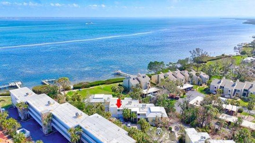 Bayfront Bliss with Gulf Access – Updated 1BR/1BA Condo-
Wake up to breakfast every morning watching breathtaking SUNRISE VIEWS over Sarasota Bay from your private lanai in this beautifully updated 1-bedroom, 1-bathroom bayfront condo. Located just steps from Gulf beaches, this prime location offers the best of both worlds—PRIVATE BEACH ACCESS to sugar-white sands or fishing and water activities off the new Beach Castle private pier on the bay. Inside, enjoy beautiful bay views from waking up in your bed or throughout the living room and the modern comforts of a new furnace and central air (2022), along with stylish updates throughout. The community features a heated pool and whirlpool, perfect for year-round relaxation and pickleball and tennis courts for some afternoon fun. Beach Castle is one of the few Longboat key properties grandfathered in to allowing short term rentals year around which provides a fantastic opportunity for vacation rental income. Whether you're looking for a personal retreat or an investment property, this bayfront gem its PRIME LOCATION is a must-see!