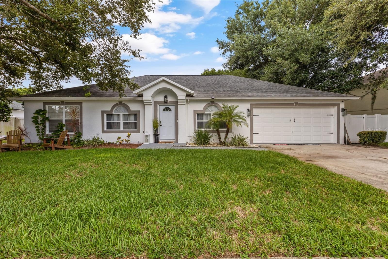 You must see this incredible 4-bedroom, 2.5-bath home that backs up to a conservation area! No rear neighbors here! This stunning residence has fresh paint and beautiful laminate flooring on the first floor. Walk into the formal living room and formal dining room, both offering plenty of space for entertaining, with a half bathroom. The large eat-in kitchen features an island with a vegetable sink and breakfast bar. The spacious open family room is perfect for relaxing. The expansive patio provides ample space for family fun. Upstairs, you'll find four bedrooms, two full bathrooms, and a laundry room, providing convenience and privacy from visitors. Discover what this wonderful house has for you today!