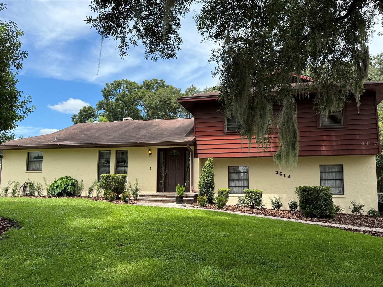 Unique Tri-Level home features 3 bedrooms, 3 full bathrooms, large family room with brick fireplace, formal living/sitting room, dining room an eat-in kitchen plus an oversized side entry 2-car garage plus a large (nearly 500 sf) covered and screen enclosed lanai overlooking the landscaped backyard. Brick paver driveway and front sidewalk. Sold AS-IS only for the convenience of the seller. SE Lakeland location is convenient to major transportation corridors that provide great access to much of Polk County and beyond. Estate Sale will be held Sept 12-14 so take time to check this one out for yourself while shopping for treasures. Interior photos will be available once the estate sale is concluded and unsold merchandise is removed.