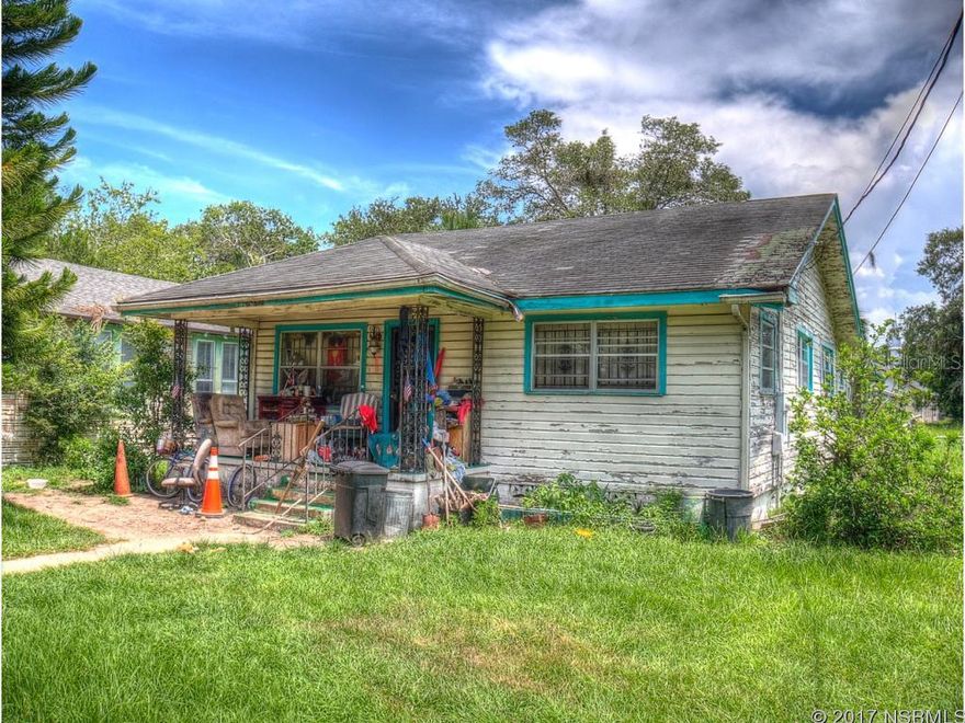 This classic home from the 1950's needs a LOT of love. Great location centrally placed in the historic district of New Smyrna Beach. Right down the street from old downtown Canal St & the "Babe" James Community Center. Pettis Park is just to the North. Link up with the famous NSB "Loop" less than a mile to the East. With almost a quarter of an acre there is plenty of room in the back yard too! ;Water: City